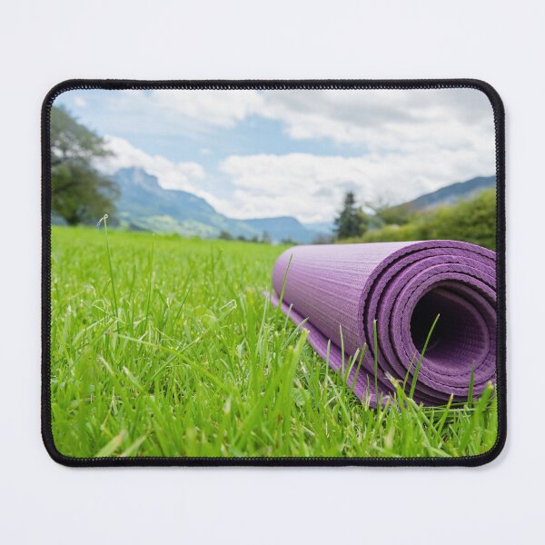 Item preview, Rolled up fitness mat on the green grass background. Switzerland Alps. Outdoor training concept designed and sold by anytka.