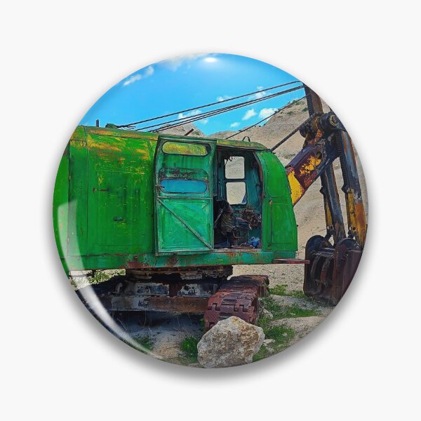 Item preview, Old and abandoned green large excavator with heavy shovel in limestone quarry. Rusty technique. Sunny summer day with clear skies and white clouds. designed and sold by trinitronboy.