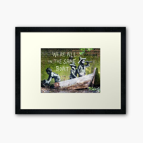 "Banksy 'We're all in the same Boat'" Framed Art Print for Sale by