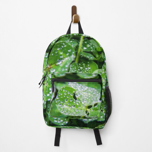 Item preview, Dew droplets of water covering green clover leaves designed and sold by James-Cole.