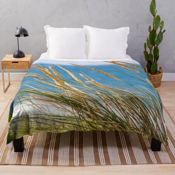 Item preview, Coastal grasses grow in front of a crystal blue summer seascape designed and sold by James-Cole.