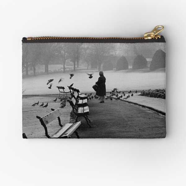 Shy woman feeding pigeons Zipper Pouch