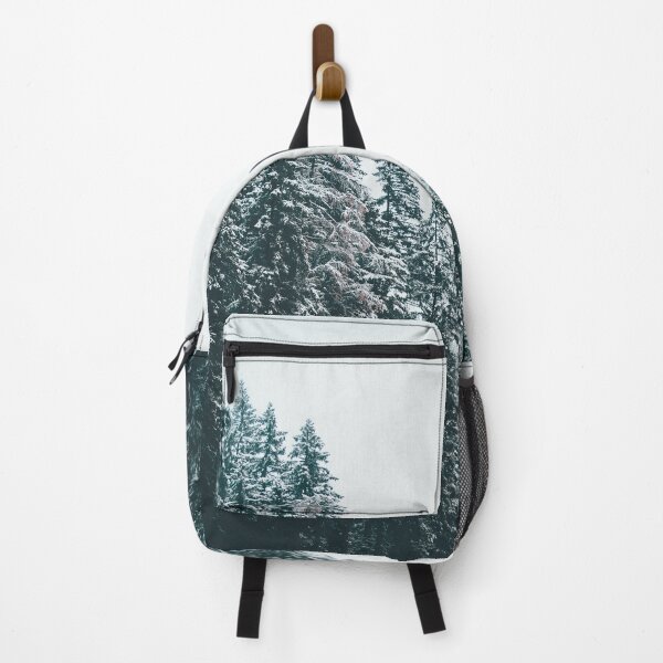 Snowy Trees On a River in Winter Backpack