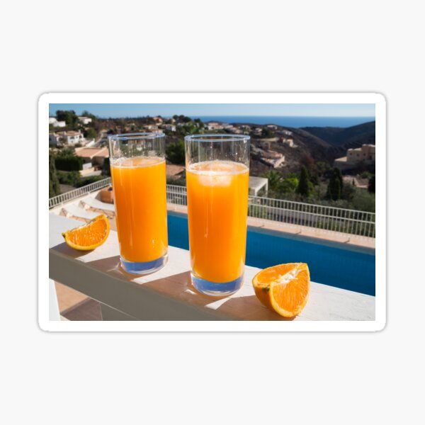 Fresh orange juice, sun and view of the Mediterranean sea Sticker