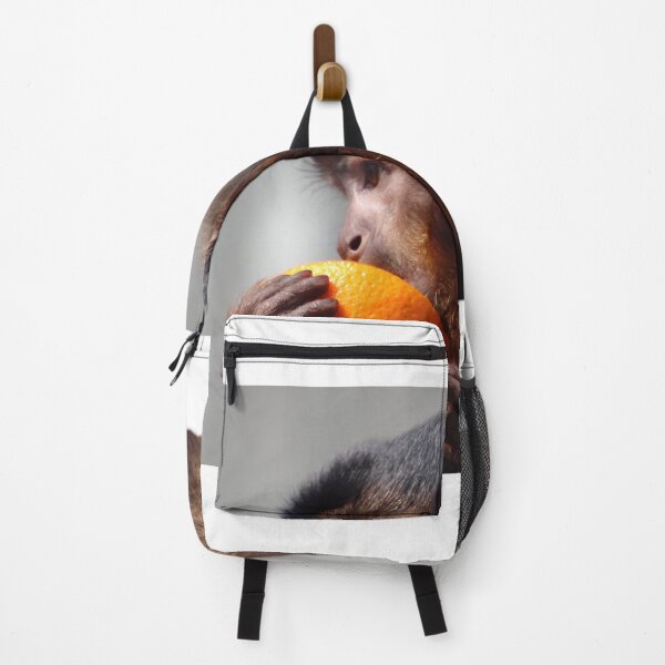 Item preview, monkey munching a piece of orange designed and sold by Gaylene Norton.