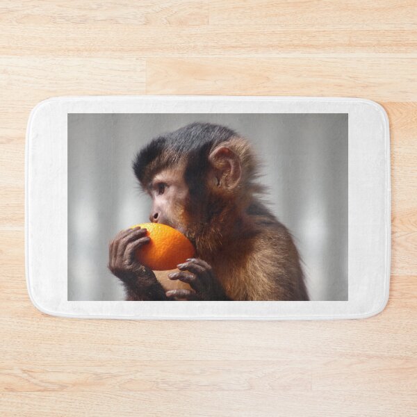 Item preview, monkey munching a piece of orange designed and sold by Gaylene Norton.