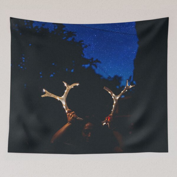 Item preview, Girl Holding Deer Antlers with String Lights designed and sold by DeniseLives.