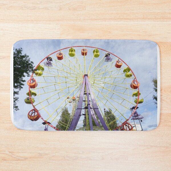 Item preview, Brightly colored Ferris wheel against the blue sky. Arkhangelsk, Russia designed and sold by Tae Mi.