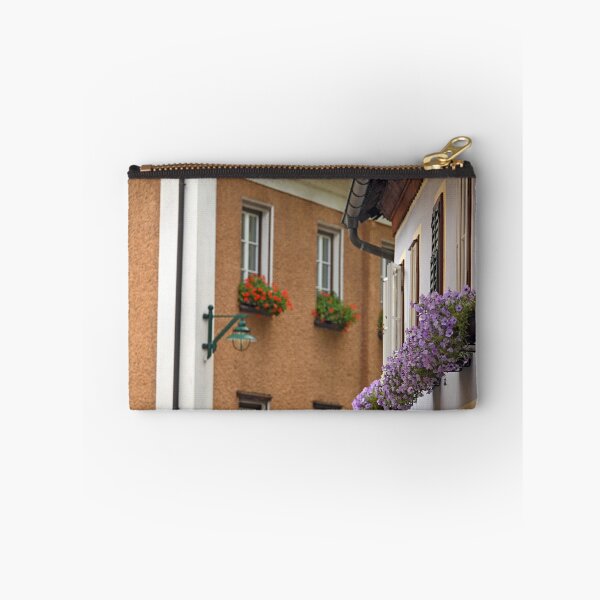 Item preview, Old houses with flowers on the windows in Hallstatt village Austria designed and sold by goceris.