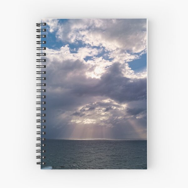 Item preview, Beautiful sky of sun shining thru the clouds on the ocean designed and sold by hendrikspix.