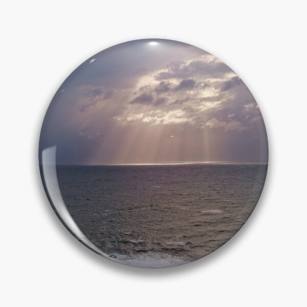 Item preview, Beautiful sky of sun shining thru the clouds on the ocean designed and sold by hendrikspix.