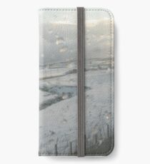 Slicing through the snowy landscape iPhone Wallet/Case/Skin