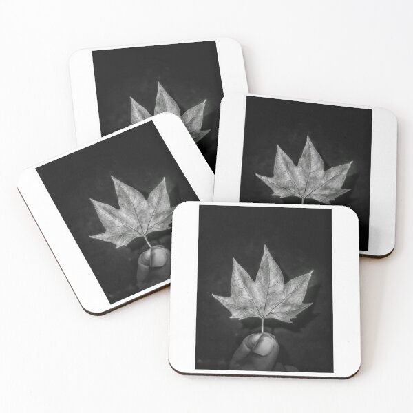Item preview, Hand Holding Falling Maple Leaf Photography  designed and sold by InnovantDesigns.