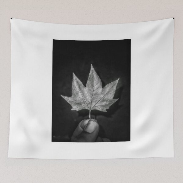 Item preview, Hand Holding Falling Maple Leaf Photography  designed and sold by InnovantDesigns.
