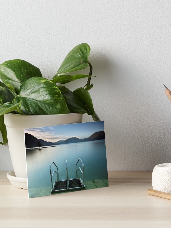 Thumbnail 1 of 2, Art Board Print, Annecy lake, morning at the beach designed and sold by patmo.