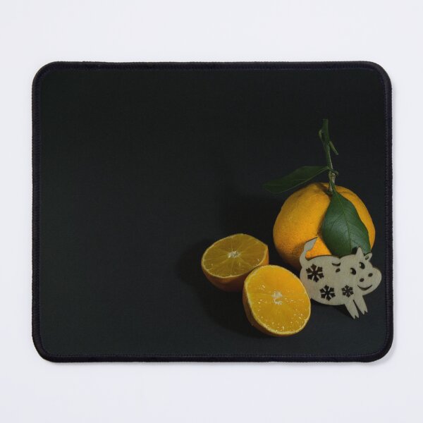 Item preview, Tangerine cut with a green leaf on a black background Goby symbol of 2020 designed and sold by Tae Mi.