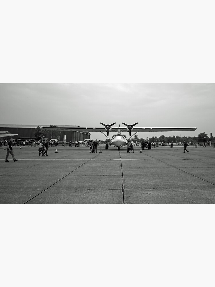 Thumbnail 3 of 3, Sticker, Man walking across consolidated PBY-5A Catalina designed and sold by santoshputhran.