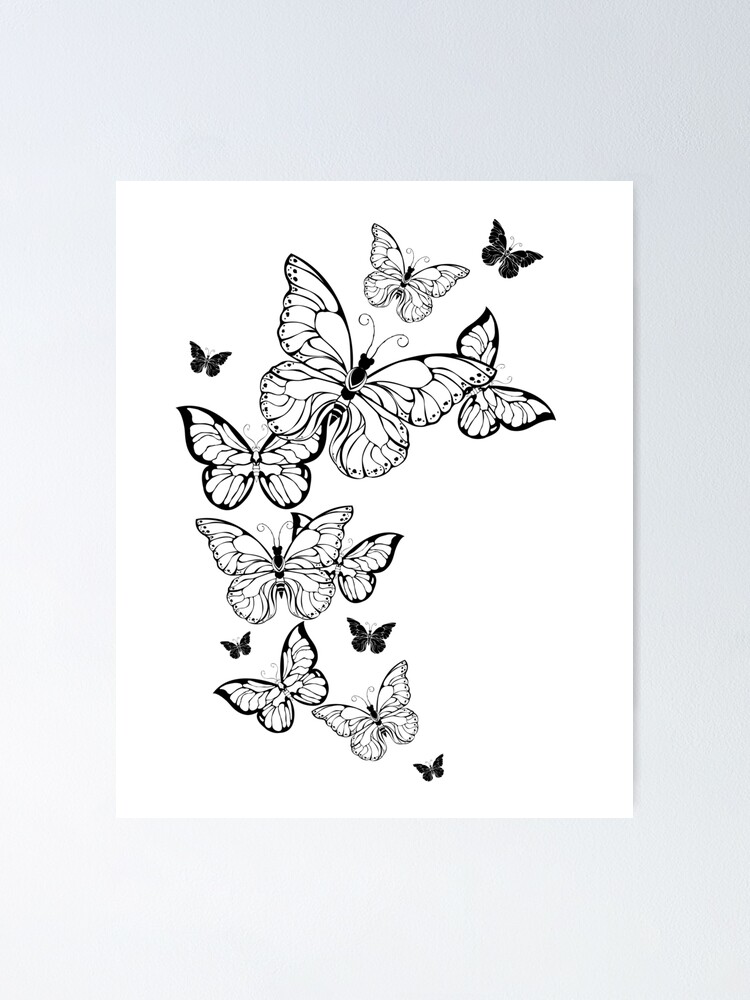 Mariposas voladoras sobre un fondo blanco.