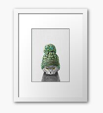 Kitten wearing a hat Framed Print