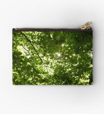 Sun light through tree branches Studio Pouch