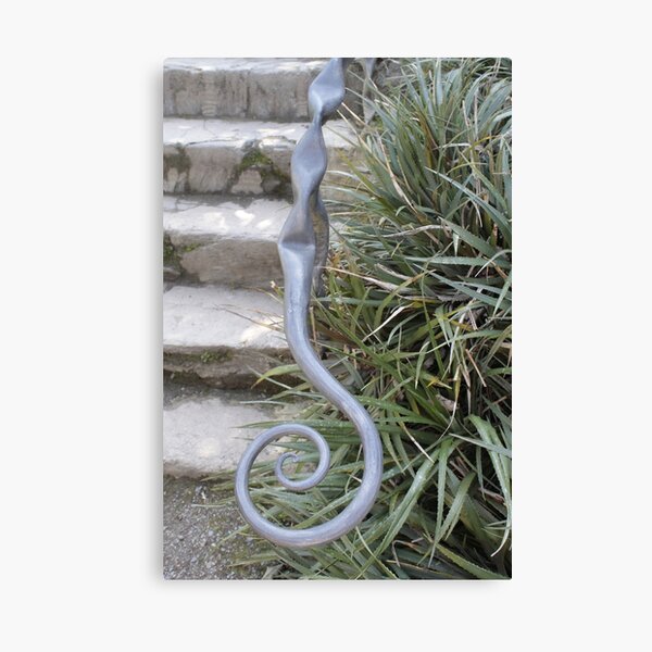 Swirly spiral metal hand rail and steps Canvas Print