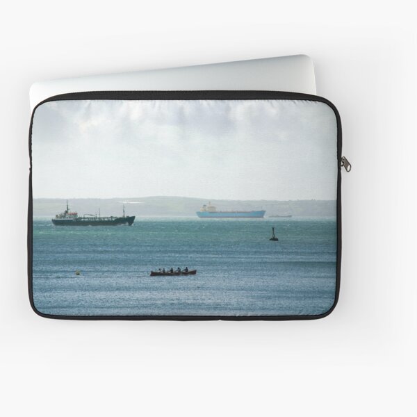 Silhouette of Gig boat racers with large cargo ships in background, St Mawes, Cornwall Laptop Sleeve