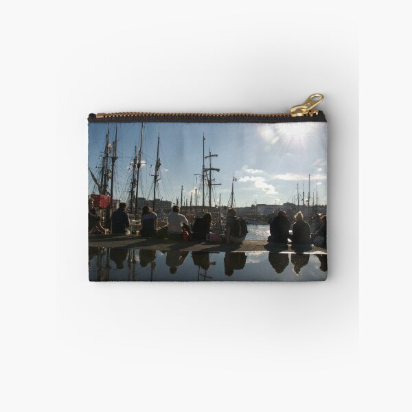 Item preview, People relaxing on the harbourside with tall ships masts behind, Brest 2008 maritime festival, France designed and sold by silverportpics.