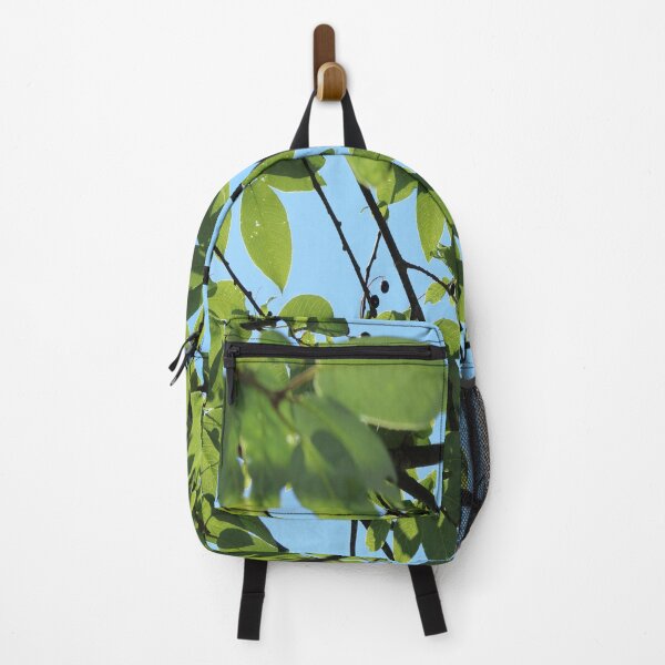 Item preview, The bird cherry tree with berries on the blue sky background designed and sold by IraNiva.