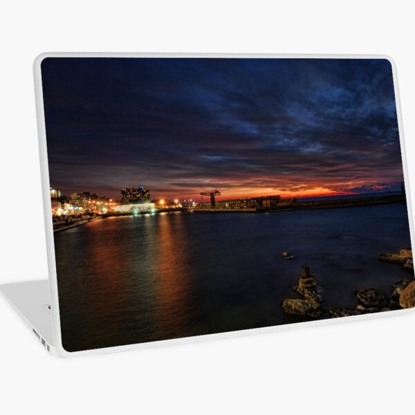 a flaming sunset at Tel Aviv port Laptop Skin