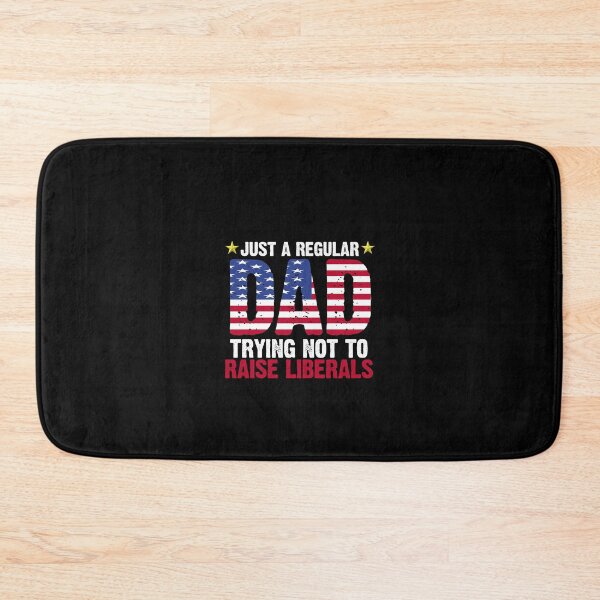 Item preview, Just a Regular Dad Trying Not to Raise Liberals designed and sold by AwakeApparel.