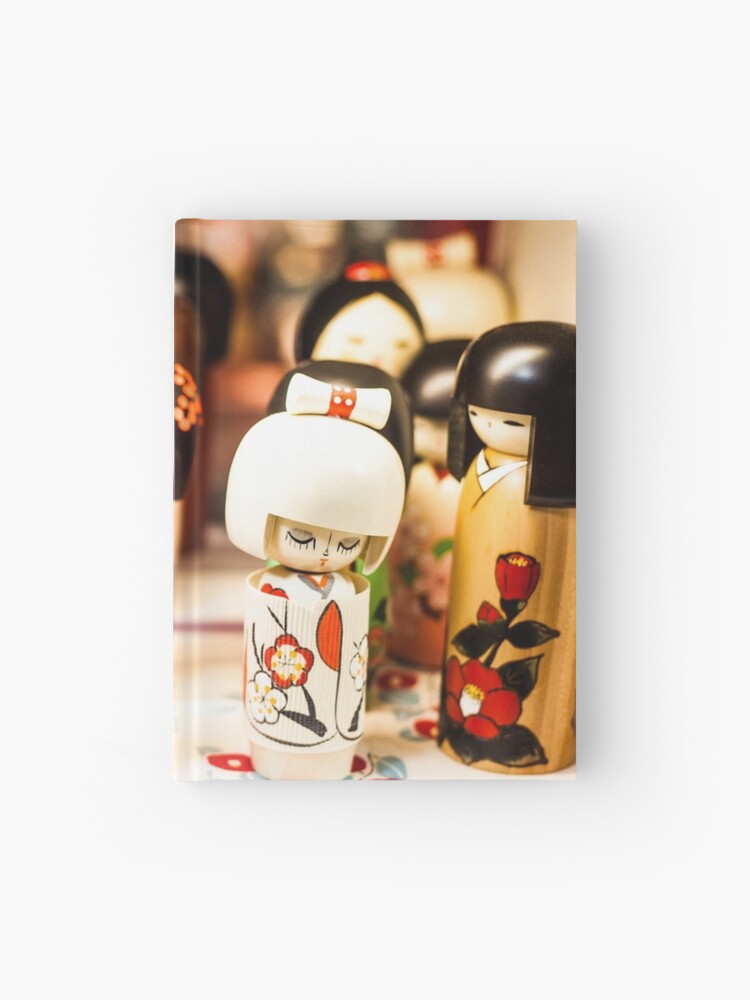 Japanese wooden dolls on sale in Tokyo, Japan Hardcover Journal for Sale  by jennyjones