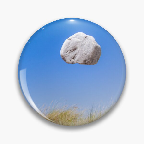 Item preview, In the air - levitating pale rock defying gravity designed and sold by Katharine Harper.