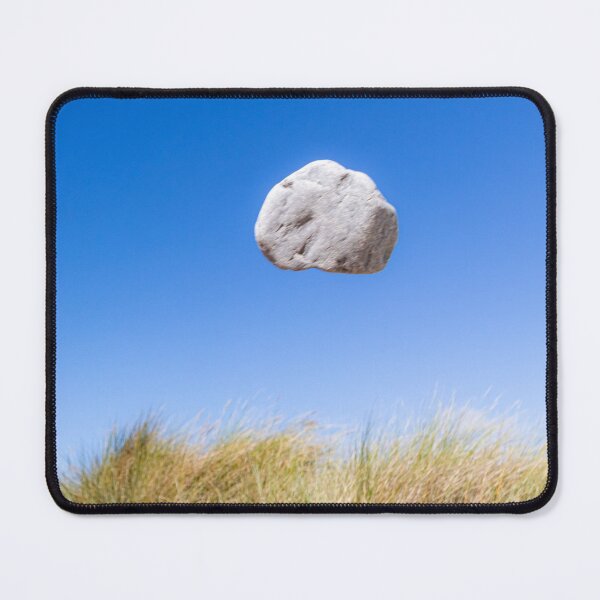 Item preview, In the air - levitating pale rock defying gravity designed and sold by Katharine Harper.