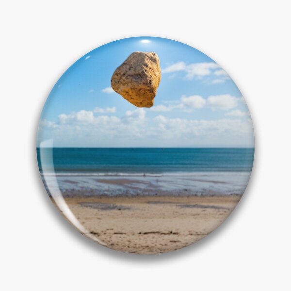 Item preview, In the air - levitating sandstone rock defying gravity at the beach designed and sold by Katharine Harper.