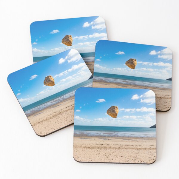Item preview, In the air - levitating sandstone rock defying gravity at the beach designed and sold by Katharine Harper.