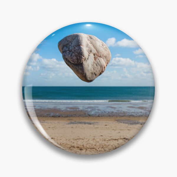 Item preview, In the air - levitating rock defying gravity at the beach designed and sold by Katharine Harper.