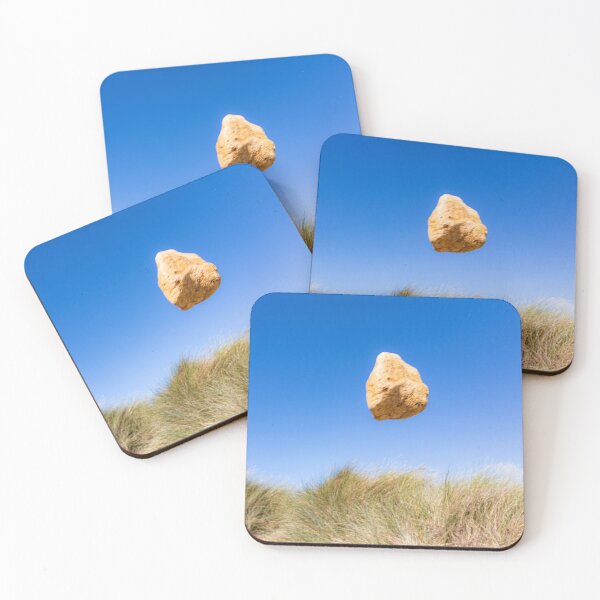 Item preview, In the air - levitating sandstone rock defying gravity on the sand dunes designed and sold by Katharine Harper.