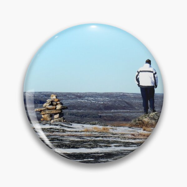 Item preview, Lonely man on the top of a mountain in Kuujjuaq, standing by an inuksuk in Kuujjuaq designed and sold by celinebisson.