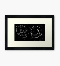 Space Skulls Framed Print