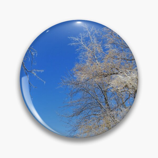 Item preview, Bright sunny day with blue clear sky and trees covered of ice after a freezing rain storm designed and sold by celinebisson.