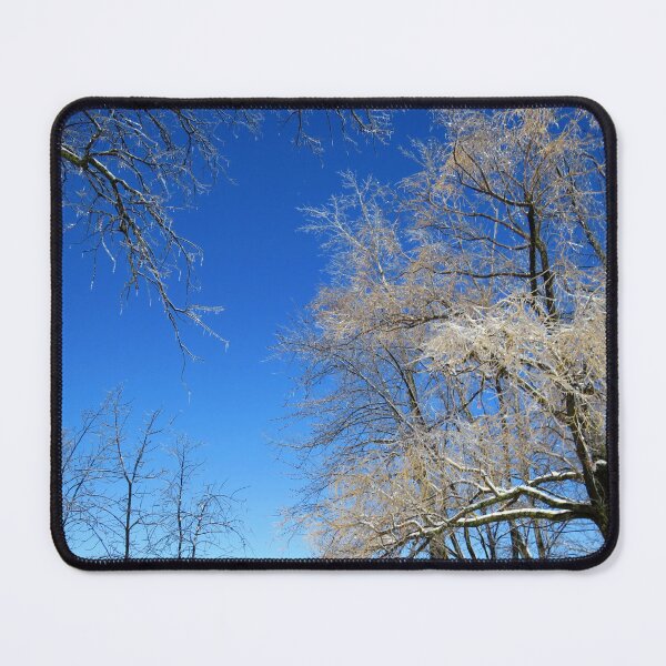 Item preview, Bright sunny day with blue clear sky and trees covered of ice after a freezing rain storm designed and sold by celinebisson.