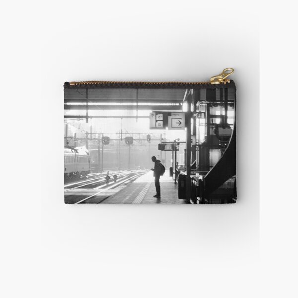 Item preview, Man waiting for train at Rotterdam Centraal. designed and sold by Noel Ali ⭐⭐⭐⭐⭐.