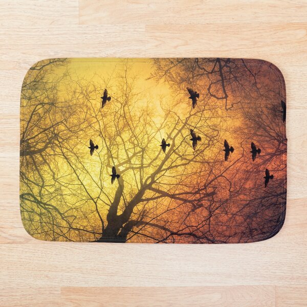 Item preview, inVasion - tree silhouettes and flock of birds against a dramatic sky designed and sold by Dyrk Wyst Redbubble Shop.