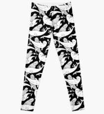 Beluga whales on black Leggings