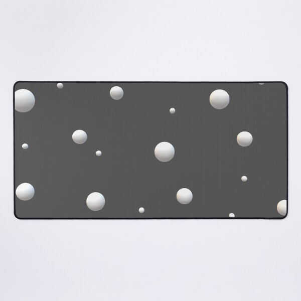 white balls on a dark gray background Desk Mat