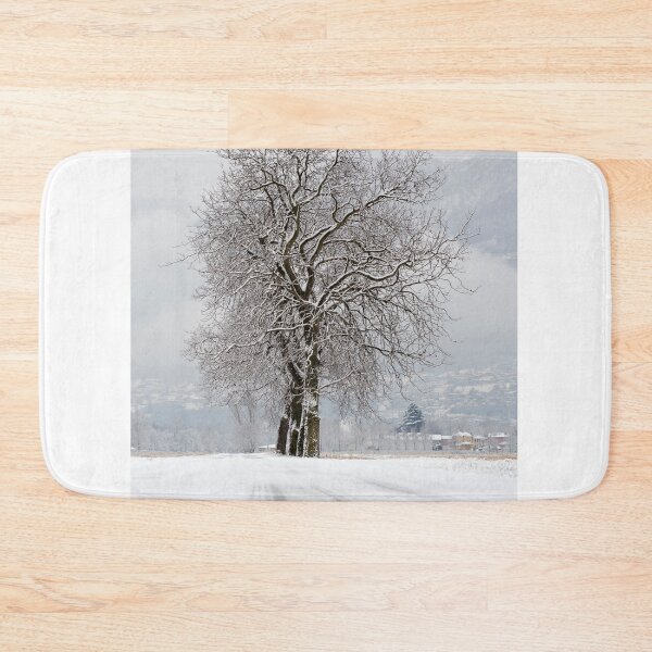 Item preview, Bare Tree on a Winter Road with Mountain in a Snowy Day designed and sold by Mats Silvan.
