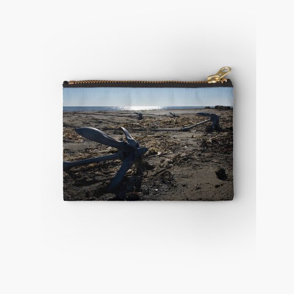 Item preview, Backlit anchors on sandy beach with seaweed designed and sold by Nick Dale Photography.