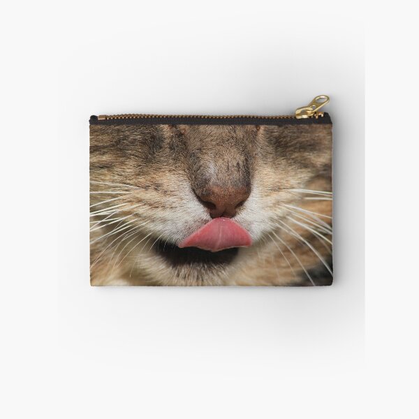 Item preview, Close-up of tabby cat licking nose designed and sold by turniptowers.