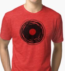Spinning within with a vinyl record... Tri-blend T-Shirt