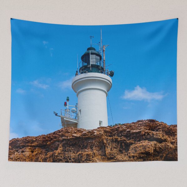 Item preview, Point Lonsdale Lighthouse standing tall on a rocky cliff edge. designed and sold by James-Cole.